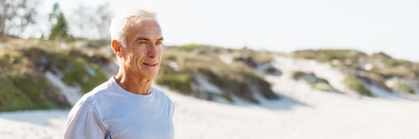 Immune Support - Man running on beach